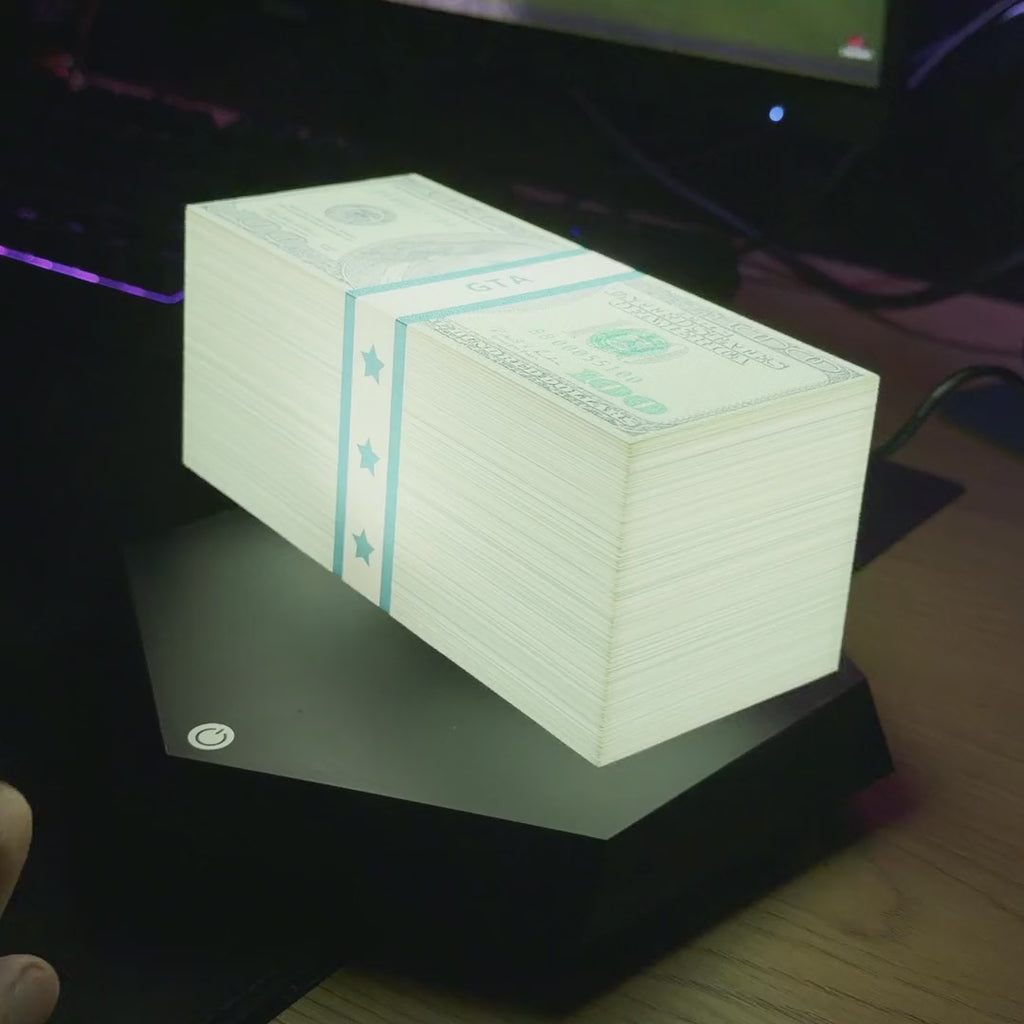 La liasse lumineuse tourne toute seule au-dessus de sa base hexagonale